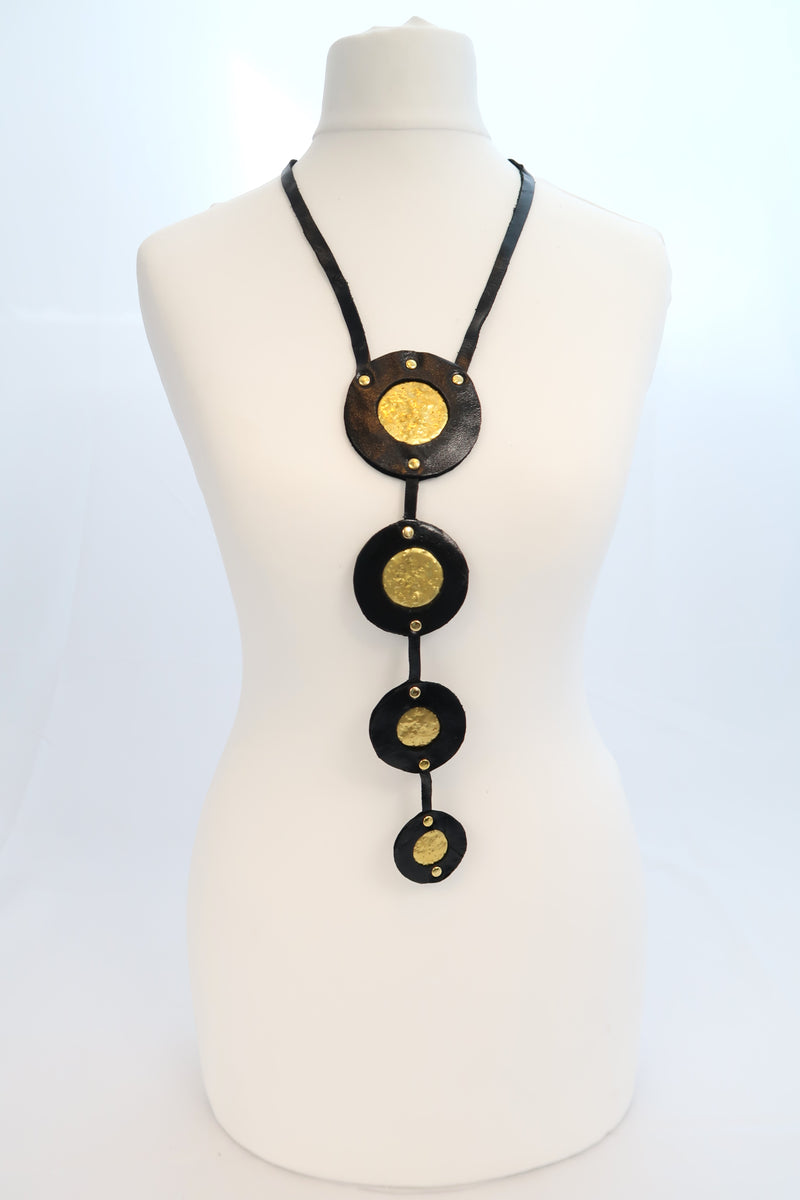 Bubbles pendant necklace made from recycled leather and tin can