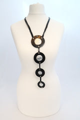 Bubbles pendant necklace made from recycled leather and tin can