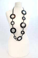 Bubbles necklace made from recycled leather and tin can