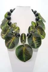 Recycled plastic bottles Coccoloba leaves with beads necklace